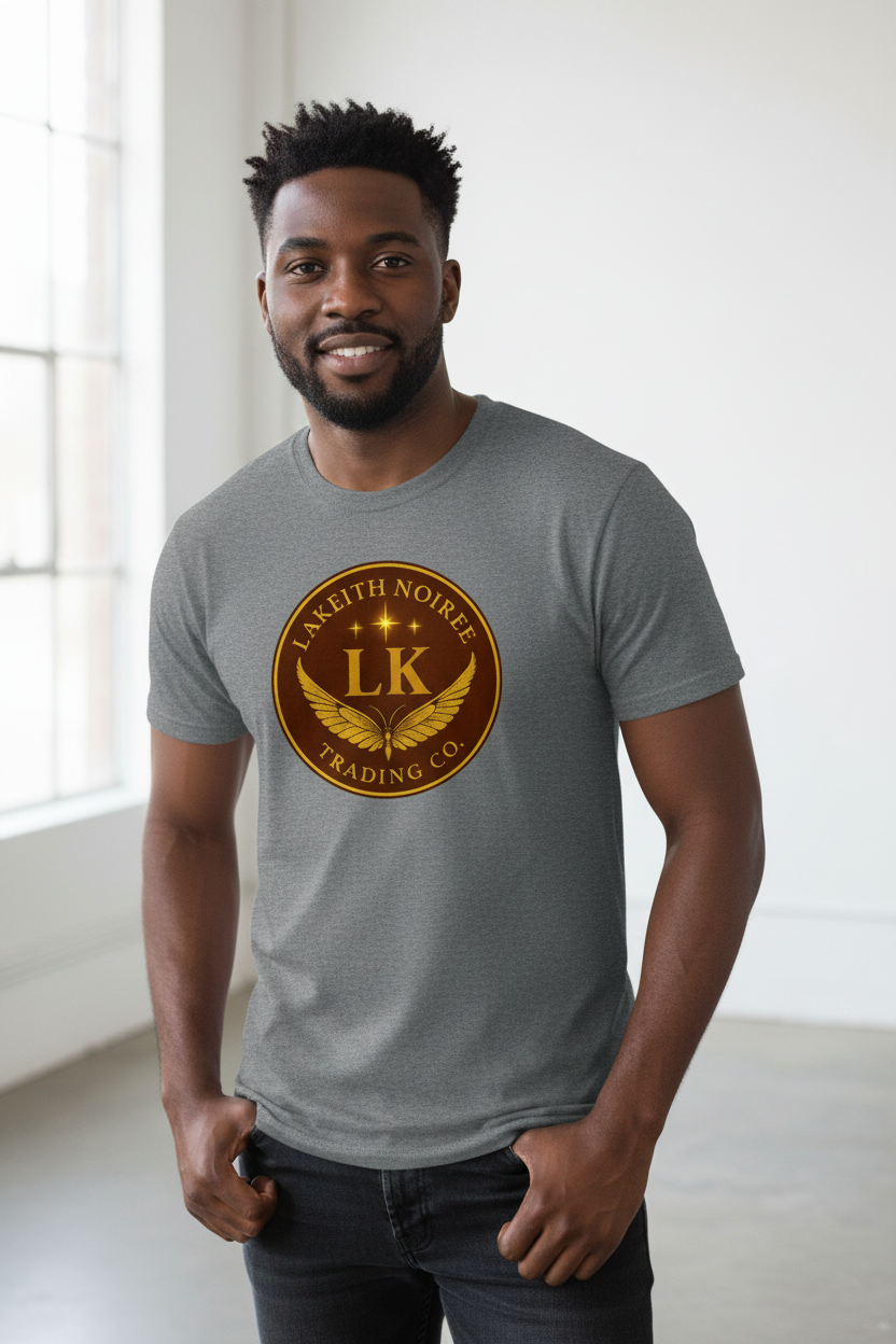 African American man wearing charcoal heather LaKeith Noirée men's premium heavyweight t-shirt with LKTC logo centered on chest
