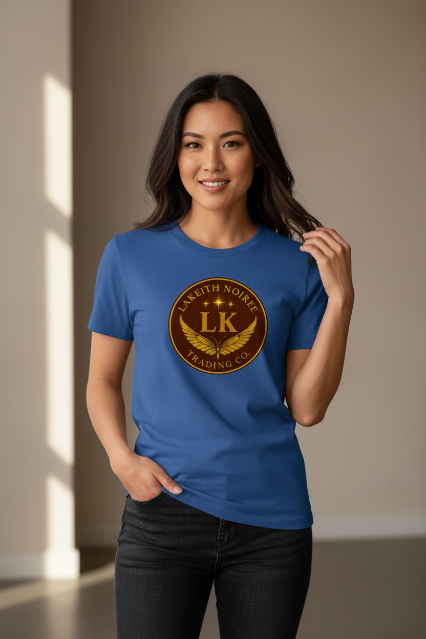 Asian woman wearing royal blue LaKeith Noirée short sleeve t-shirt with LKTC logo centered on chest