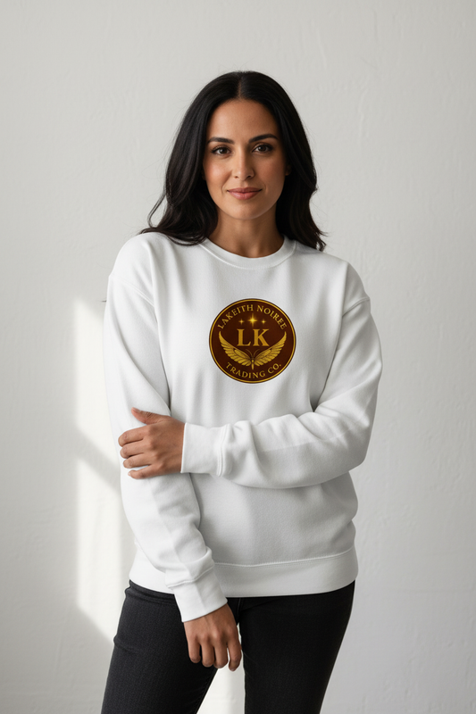 Middle Eastern woman wearing white LaKeith Noirée unisex organic sweatshirt with LKTC logo centered on chest